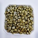 Miçanga Alfabeto Letra Arredondado Dourado 4x7mm- 50G - Imagem 2