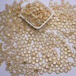 Miçanga para Pulseira Entremeio Flor Dourada ABS 8mm - Imagem 2