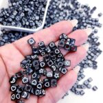 Miçanga Entremeio Figuras Quadrada 6x6mm preto c/branco
